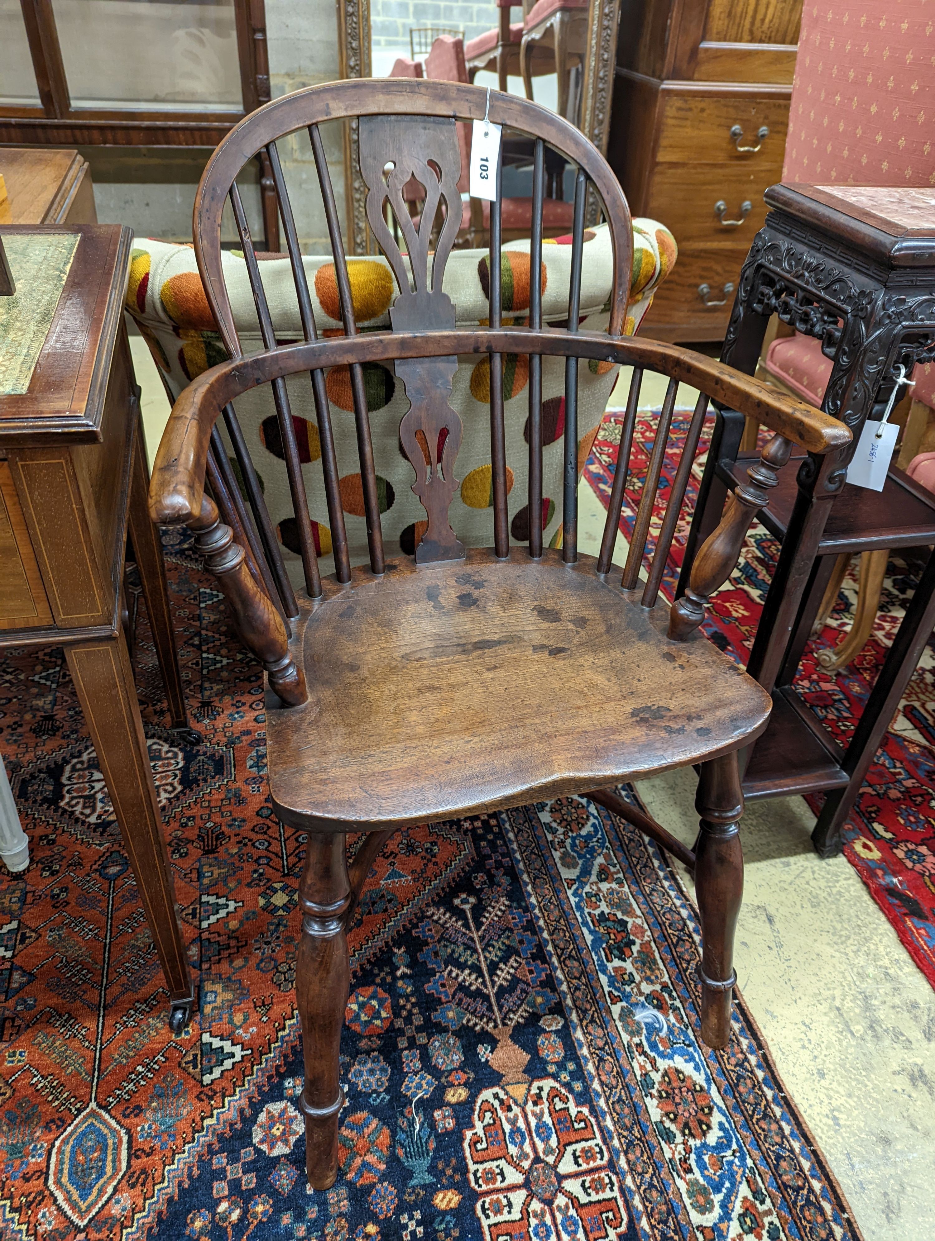A mid 19th century Windsor yew and elm Windsor elbow chair, width 58cm, depth 42cm, height 91cm